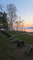 Evening workout session documented at lakeside park in Chaikovsky