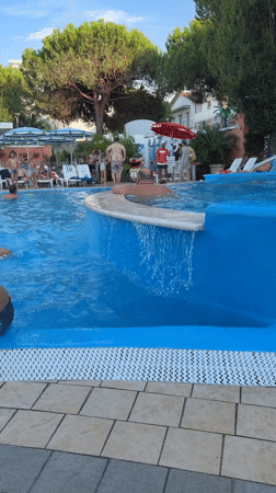 Crowded summer pool day at Atlantis Bay, Gatteo