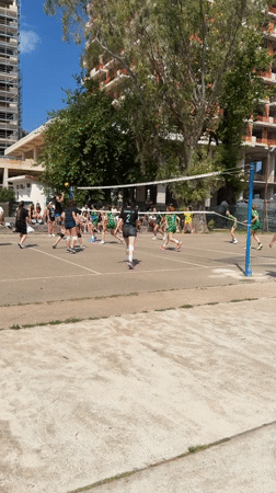 Morning scenes from Budva include volleyball match, sailboats, family moments
