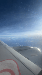 Passenger films aerial views during flight over Katunayake, Sri Lanka