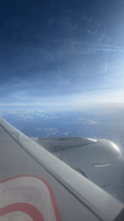 Passenger films aerial views during flight over Katunayake, Sri Lanka
