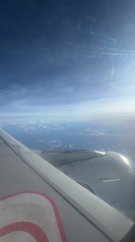 Passenger films aerial views during flight over Katunayake, Sri Lanka