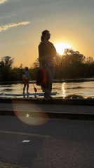 Evening recreation captured along Plovdiv waterfront during golden hour