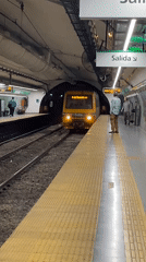Buenos Aires Subte train arrives at underground station
