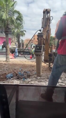 Morning scenes from Marrakesh: construction, salon service, dog interactions