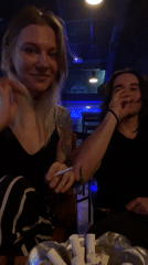 Two people recorded sitting at Belgrade bar