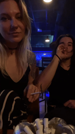 Two people recorded sitting at Belgrade bar
