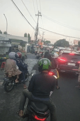 Street activity and everyday details in Surabaya, Indonesia
