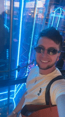 Young man shops, takes selfies at Moscow mall