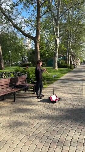 Street musicians perform for families in Krasnodar park