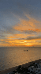 Sunset captured over calm seas in Pattaya, Thailand