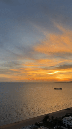 Sunset captured over calm seas in Pattaya, Thailand