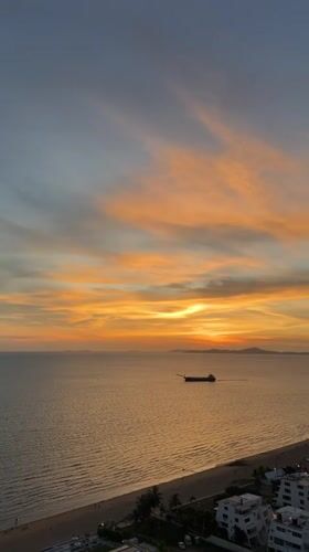 Sunset captured over calm seas in Pattaya, Thailand