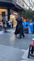 Tango dancers perform street show for crowd in Buenos Aires