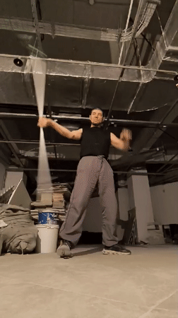 Martial arts practice in a raw, unfinished Karagandy interior