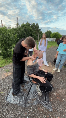 Outdoor hangout in Chaikovsky: grilling, haircuts, and riverside sunset