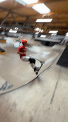 Scooter rider falls attempting trick at Corby indoor skatepark