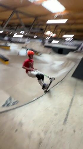 Scooter rider falls attempting trick at Corby indoor skatepark