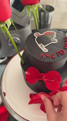 Tel Aviv residents document cake, roses, and curious dog
