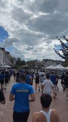Early morning runners gather on brick streets in Varna