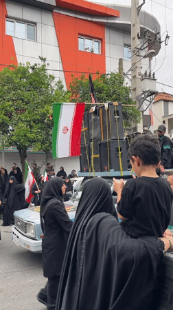 Religious procession with sound truck rolls through Babol, Iran