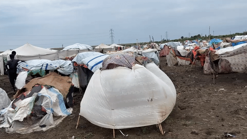 Makeshift shelters fill a displacement camp in Al Babali, Sudan