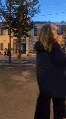 Group marches, woman dances in streets of Rousset, France