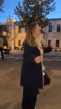 Group marches, woman dances in streets of Rousset, France