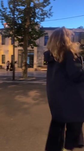 Group marches, woman dances in streets of Rousset, France