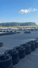 Outdoor go-kart racing on a sunny day in Russia