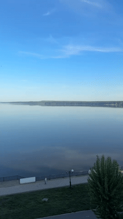 Peaceful waterfront morning captured in Votkinsk, Russia
