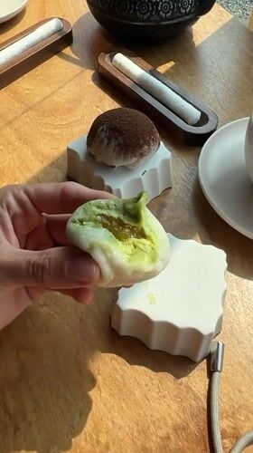 Traditional tea service with mochi desserts documented in Vladivostok