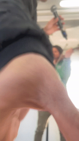 Street musicians perform in subway car in Barcelona area