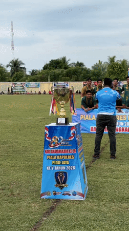Bhayangkara Cup soccer match and trophy ceremony, Pidie, Indonesia