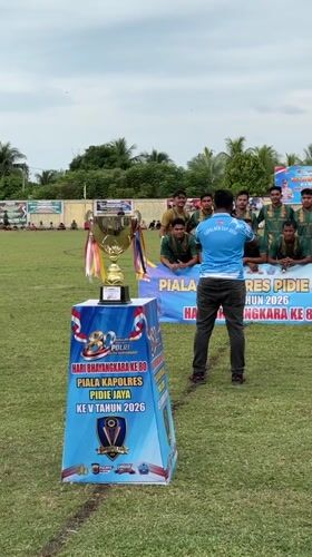 Bhayangkara Cup soccer match and trophy ceremony, Pidie, Indonesia