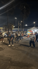 Traditional dance group performs nighttime street choreography in Arica