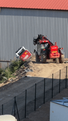 Telehandler recovers overturned compact vehicle on Prague dirt slope