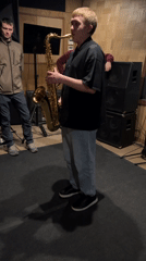 Saxophonist performs in Moscow studio session