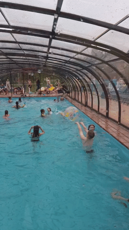 Children swim at covered pool facility in Birobidzhan, Russia