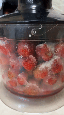 Strawberry puree and croissants in a Russian kitchen