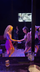 Friends gather for karaoke party at local bar