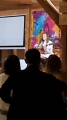 Live acoustic performance at an intimate indoor gathering in Izky