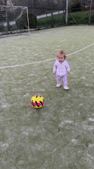 Children play soccer on artificial turf field in Tryavna