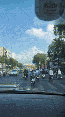 Daytime street scene captured from vehicle in Nha Trang