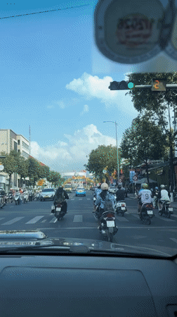 Daytime street scene captured from vehicle in Nha Trang