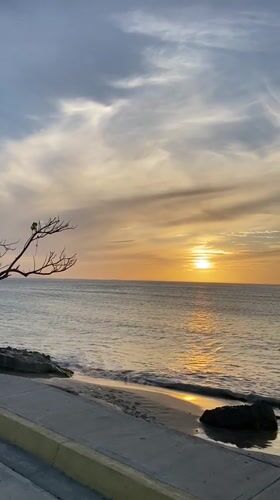 Evening sunset gatherings documented along Juan Griego waterfront