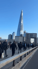 Busy pedestrian traffic observed on London bridge walkway