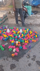 Colorful street market scene outside Mesjid Tuha shops
