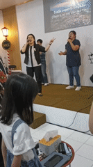 Live music performance at a community hall in Magelang
