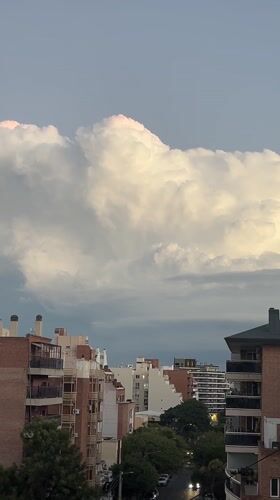 Dramatic orange clouds observed over Cordoba residential districts